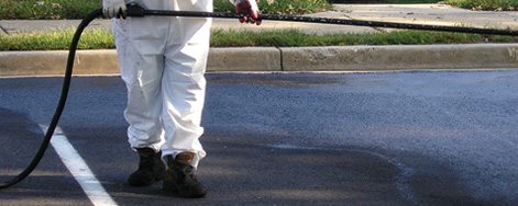 gentleman paving a parking lot