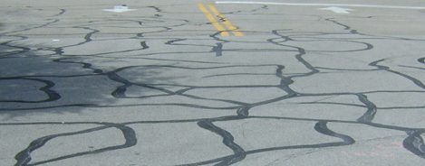 faded road and cracks