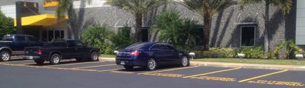 Ringhaver facility parking lot after new pavement and seal